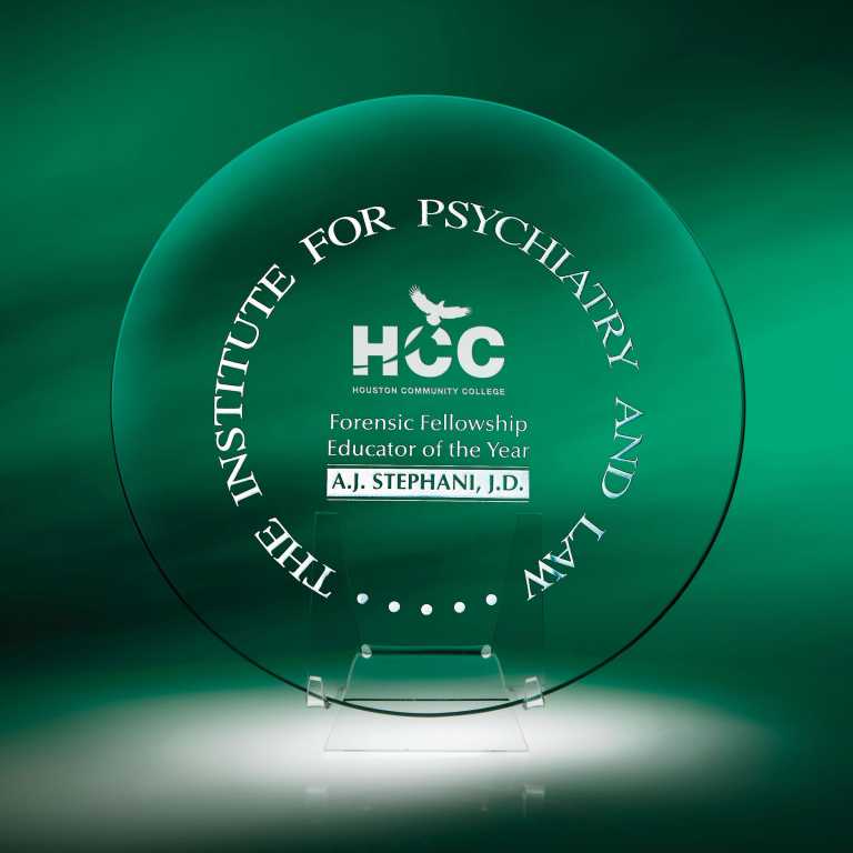 Personalized Engraved Round Crystal Plate on Green Background
