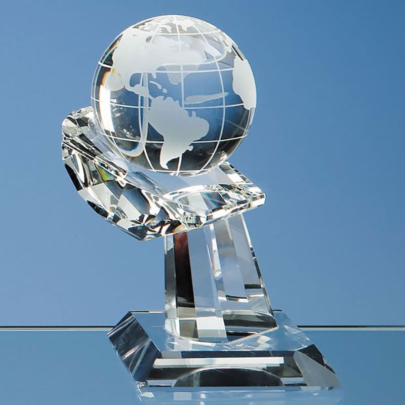 Engraved Crystal Globe on Hand Award