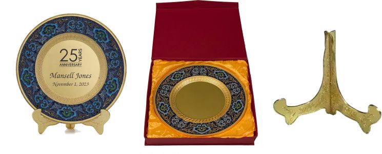 gold presentation plate with blue trim red presentation box and plate stand